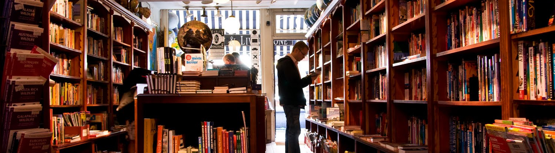 Inside the book shoppe with person in the background